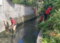 Tagana Padang Hilir Bersihkan Drainase Utama Gampong