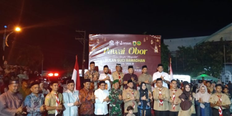 Gudep Pramuka SMKN 2 Ikut Pawai Obor Menyambut Bulan Ramadan 1447 H