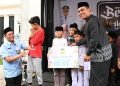 Bupati Aceh Besar Serahkan Santunan untuk 4.800 Anak Yatim