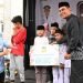 Bupati Aceh Besar Serahkan Santunan untuk 4.800 Anak Yatim