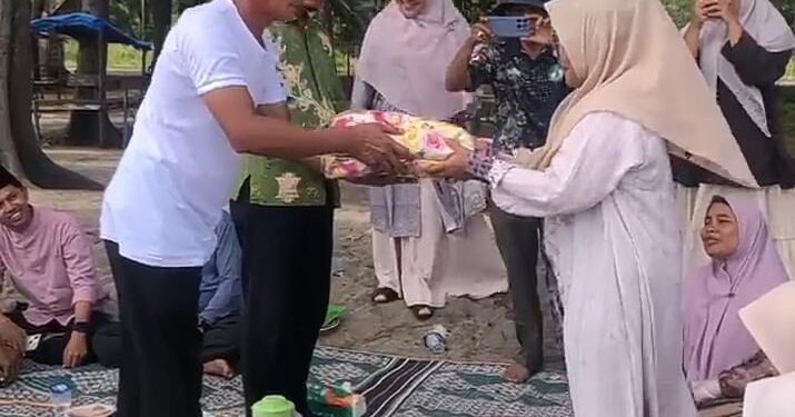 Perpisahan Penuh Haru di KUA Kota Fajar: Jejak Pengabdian Ibu Asmidar B Tak Terlupakan