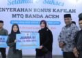 Pemko Banda Aceh Serahkan Bonus kepada Kafilah Berprestasi
